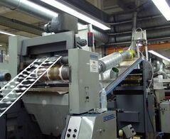 Extraction system for punching scrap and self-adhesive label